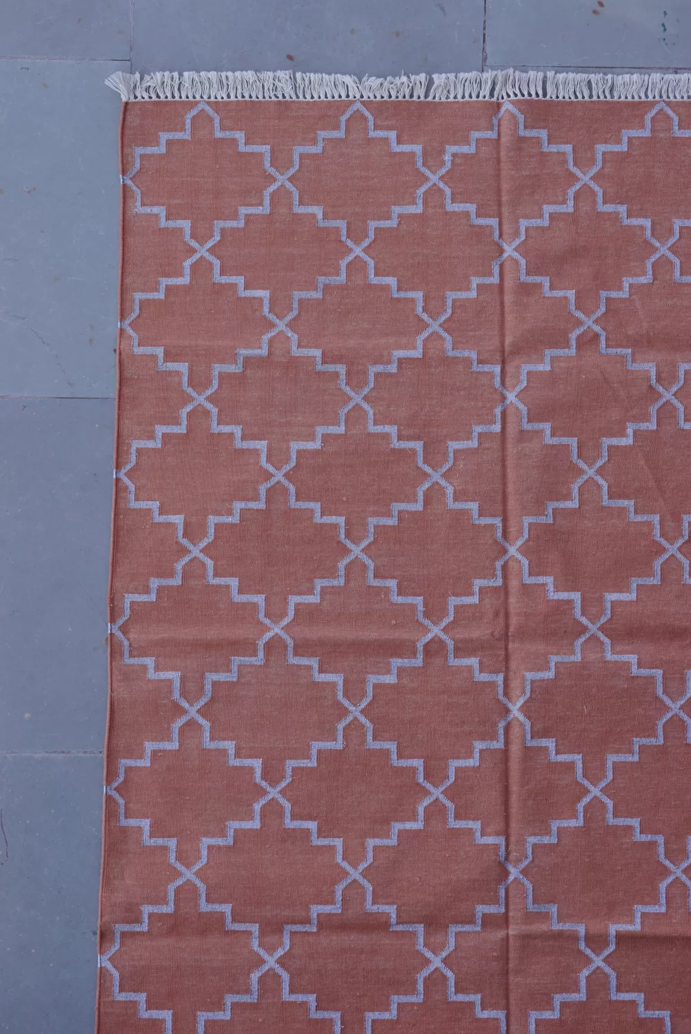 reversible terracotta orange cotton rug handmade Jodhpur