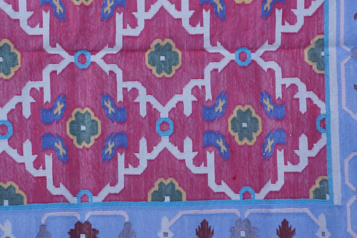 deep pink cotton dhurrie rug flatweave texture
