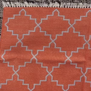 burnt orange cotton dhurrie rug flatweave texture