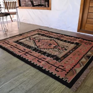 muted coral pink wool dhurrie rug flatweave texture