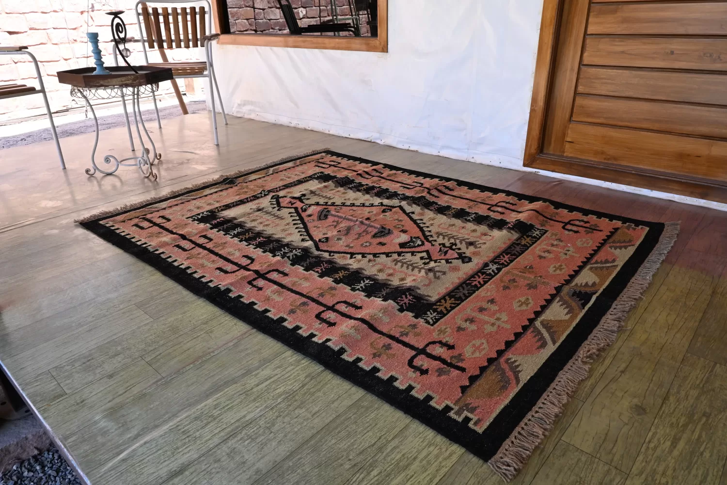 muted coral pink wool dhurrie rug flatweave texture